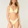 Braguita de bikini atrevida con cintura en V y pierna alta acanalada