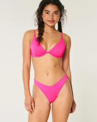 Braguita de bikini atrevida con cintura en V y pierna alta acanalada