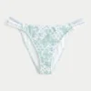 Braguita de bikini atrevida con doble tirante y ribete de estilo croché