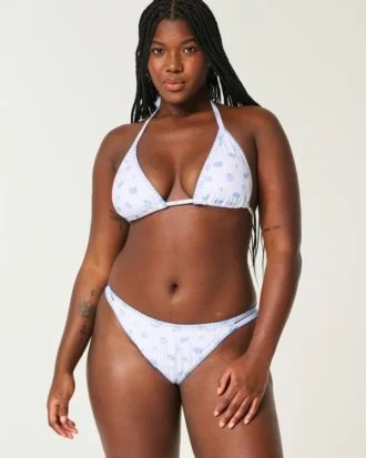 Braguita de bikini atrevida con tirantes y bordado en la parte superior de la pierna