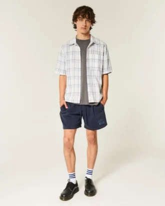Camisa de manga corta con bolsillos y corte cuadrado