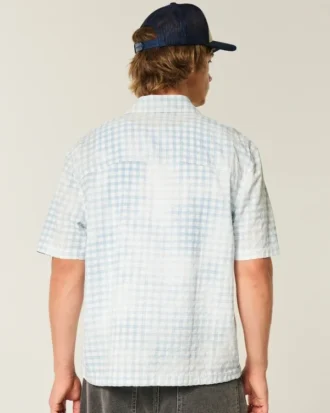 Camisa de manga corta con bolsillos y corte cuadrado
