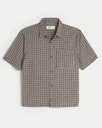 Camisa de manga corta con cuello redondo y tejido seersucker
