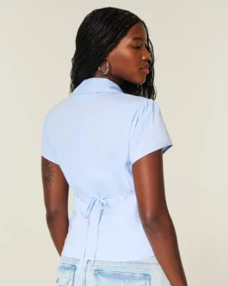 Camisa elástica de popelín con botones y manga corta