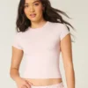 Camiseta de bebé con cuello redondo, tejido elástico suave y sin costuras