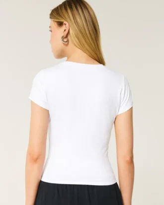 Camiseta de cuello redondo para bebé de tejido elástico suave sin costuras