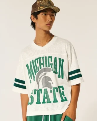Camiseta de fútbol americano con gráfico de los Spartans de la Universidad Estatal de Míchigan