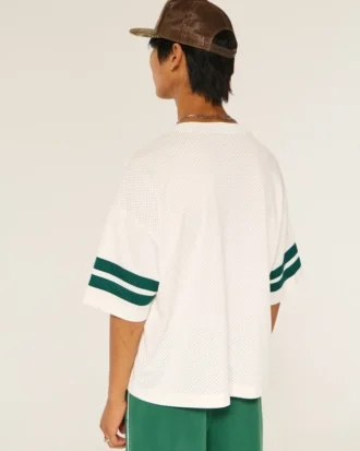 Camiseta de fútbol americano con gráfico de los Spartans de la Universidad Estatal de Míchigan