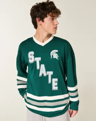 Camiseta de hockey con gráfico de los Spartans de la Universidad Estatal de Míchigan