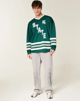 Camiseta de hockey con gráfico de los Spartans de la Universidad Estatal de Míchigan