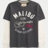 Camiseta gráfica de manga larga con logo en capas