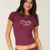 Camiseta gráfica para bebé Naughty But Nice