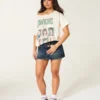 Camiseta oversize con estampado Stranger Things y hombros descubiertos