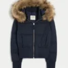 Chaqueta bomber acolchada con ribete de piel sintética