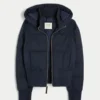 Chaqueta bomber acolchada con ribete de piel sintética