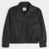 Chaqueta con cremallera de cuero vegano