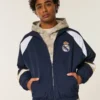 Chaqueta deportiva con estampado del Real Madrid CF y forro polar Chaqueta deportiva con estampado del Real Madrid CF y forro polar