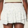 Falda pantalón mini con dobladillo asimétrico