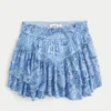 Falda pantalón mini con dobladillo asimétrico