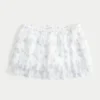 Falda pantalón mini de gasa con volantes
