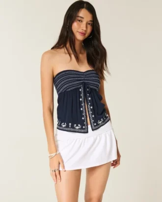 Falda pantalón mini de punto con vuelta