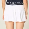 Falda pantalón mini de punto con vuelta