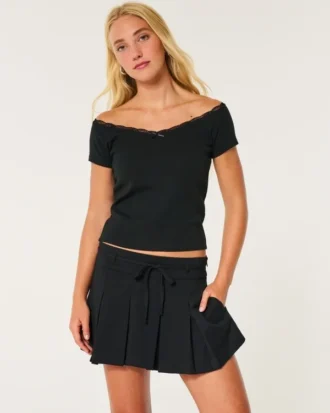Falda pantalón mini plisada de talle medio