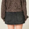 Falda pantalón mini vaquera de talle bajo