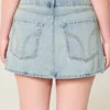 Falda pantalón mini vaquera de talle bajo