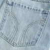 Falda pantalón mini vaquera de talle bajo