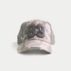 Gorra trucker con estampado de camuflaje rosa