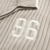 Jersey con cremallera y gráfico relajado
