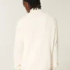 Jersey cuadrado con cremallera hasta el pecho