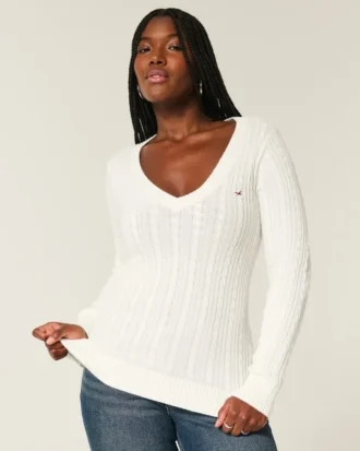 Jersey de cuello en V con diseño icónico de punto trenzado