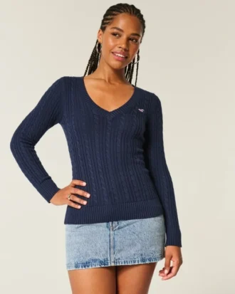 Jersey de cuello en V con diseño icónico de punto trenzado