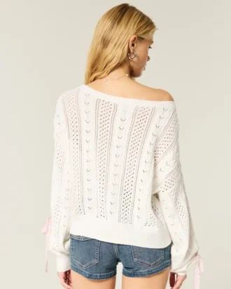 Jersey de punto trenzado con mangas con lazo