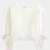 Jersey de punto trenzado con mangas con lazo