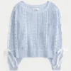 Jersey de punto trenzado con mangas con lazo