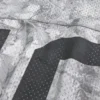 Jersey holgado con estampado de camuflaje