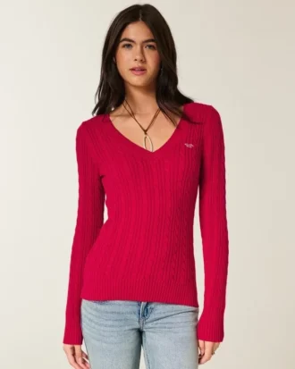 Jersey icónico de cuello en V con tejido de punto trenzado