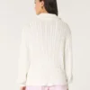 Jersey oversize de punto trenzado con media cremallera