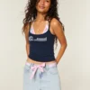 Mini falda pantalón vaquera con cintura baja y lazo Mini falda pantalón vaquera con cintura baja y lazo