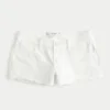Mini shorts vaqueros blancos desgastados de talle bajo