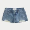 Mini shorts vaqueros de talle bajo y lavado medio desgastado