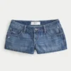 Mini shorts vaqueros desgastados de talle ultra bajo y lavado medio