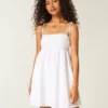 Mini vestido babydoll con tirantes anudados