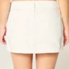 Minifalda pantalón vaquera blanca de talle bajo
