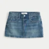 Minifalda pantalón vaquera bordada de lavado medio