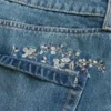 Minifalda pantalón vaquera bordada de lavado medio