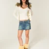 Minifalda pantalón vaquera bordada de talle bajo